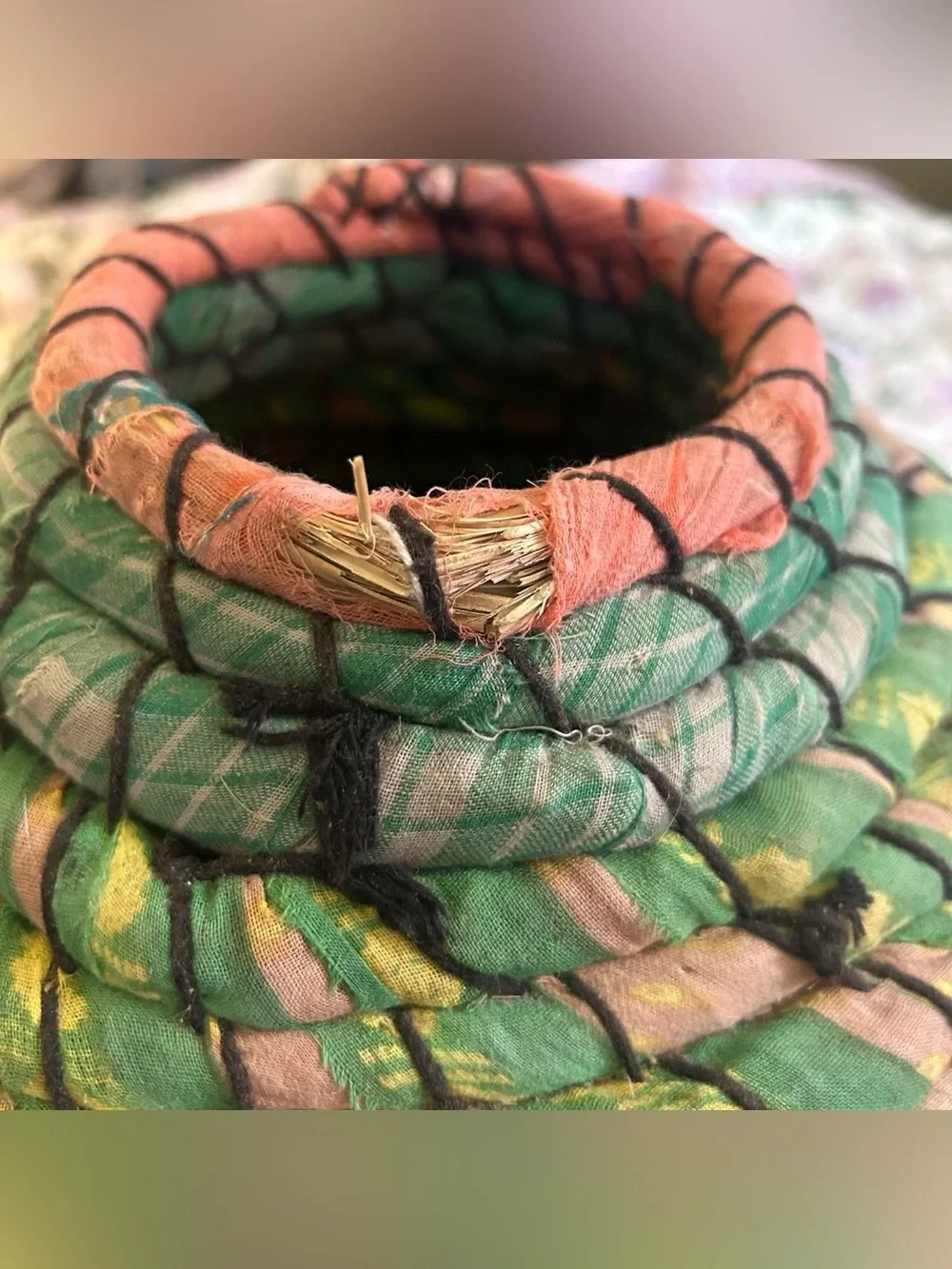 Handmade woven cloth covered basket